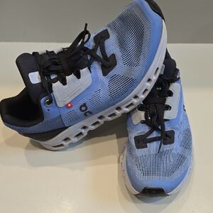 On Running Blue and Black Athletic Shoes